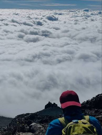 View looking down into the massive caldera and ash cone of Mount Meru from Elephant Ridge
