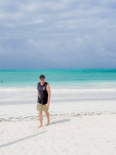 Beautiful luxury beachfront resort pool looking directly at the Paje white sand shoreline